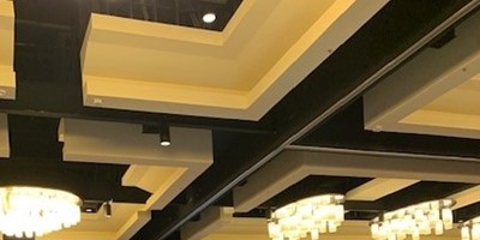 Attendees mingling and chatting with the Successware team in our booth at the SGI trade show.