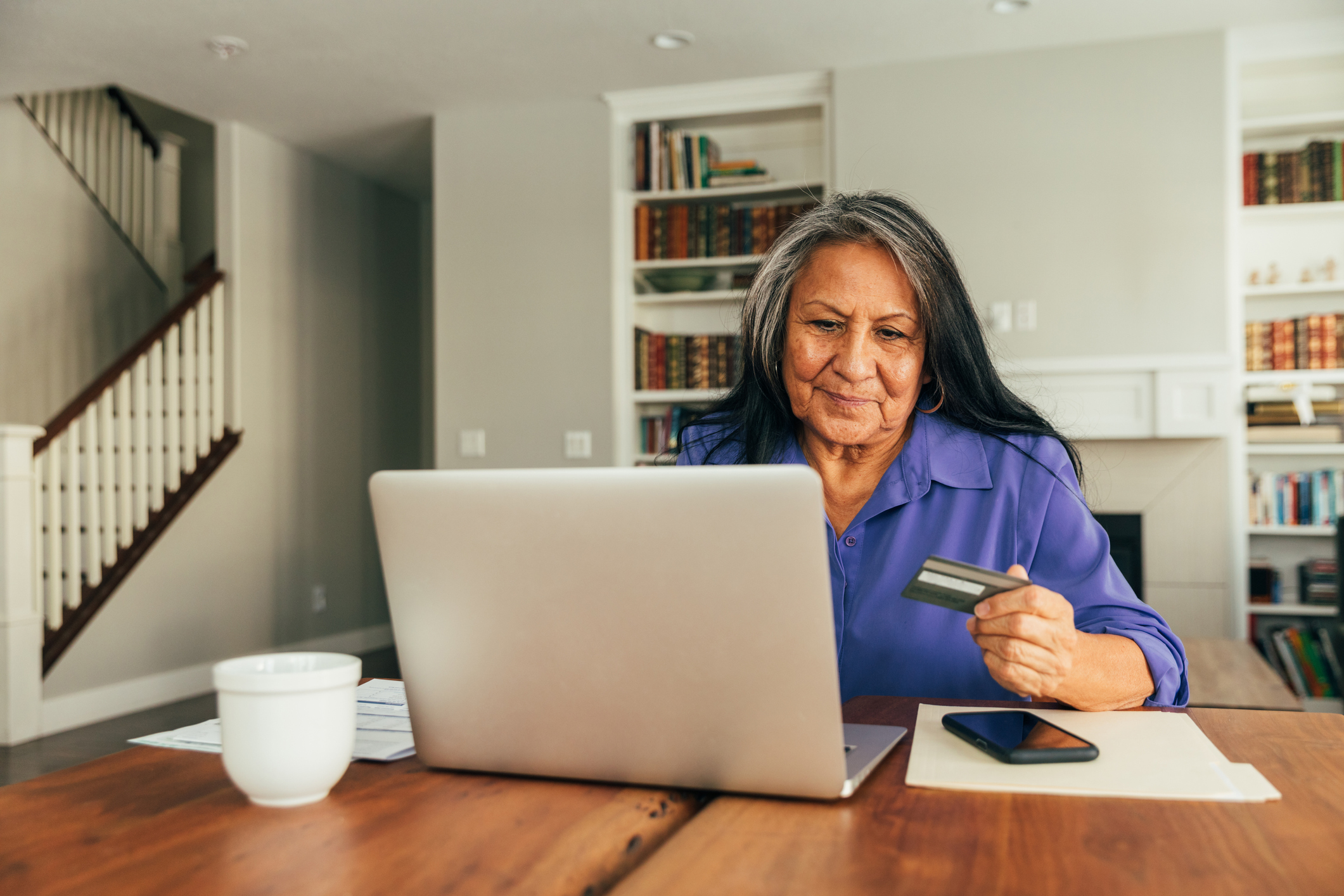 Senior Woman Paying Bills Online